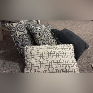 Like new (4) pillows - 3 square and 1 rectangular